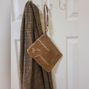 Roots Tribe Wristlet with French script